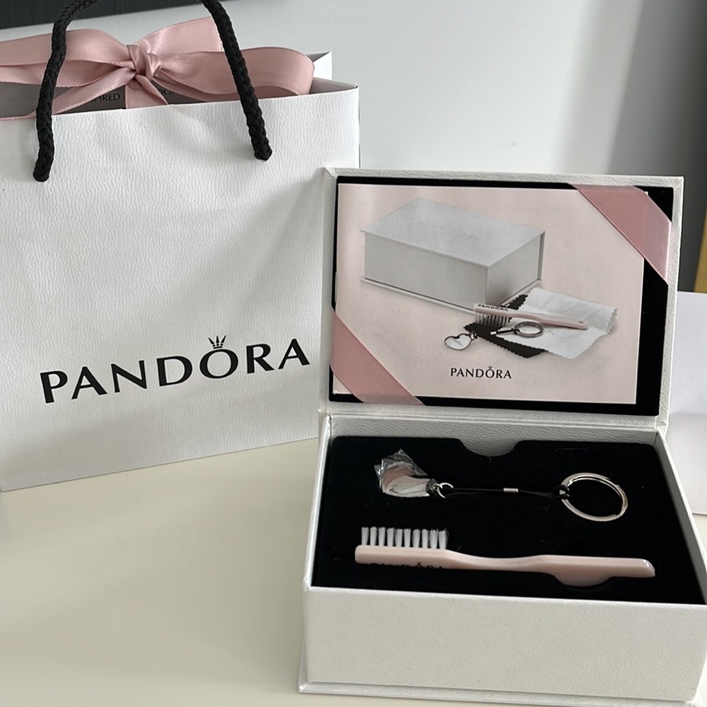 Pandora’s keychain and cleaning brush 😎
